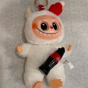 Coca-Cola la BUBU Series Vinyl Face  Plush with Red and White Accents Used